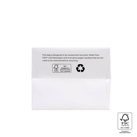 Image of White paper bag with recycling information and FSC logo on a white background