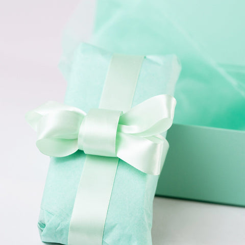 Image of Wrapping the  item with our NEON Acid-Free Tissue Paper - Mint Green with Satin ribbon