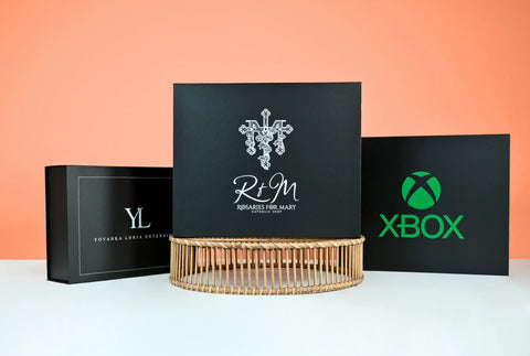 3 black printed gift boxes