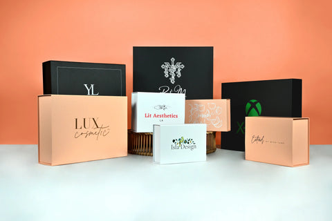 different colours of gift boxes printed with logo