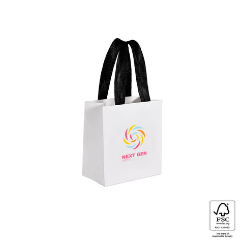 Image of White tote bag with black handles and Apple logo on a white background