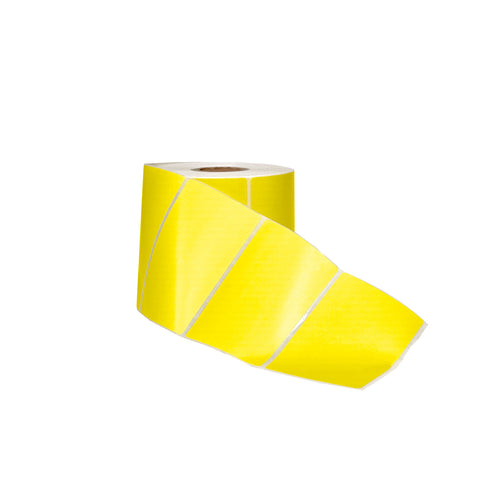 Yellow tape roll on white surface.