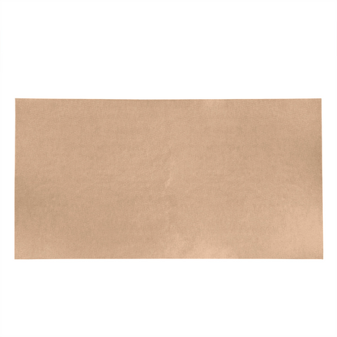 Image of kraft paper gift wrap laying flat on a white surface