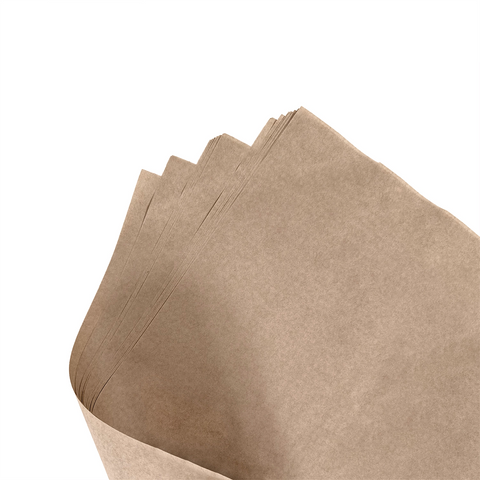 Image of Stack of brown paper sheets on a white background