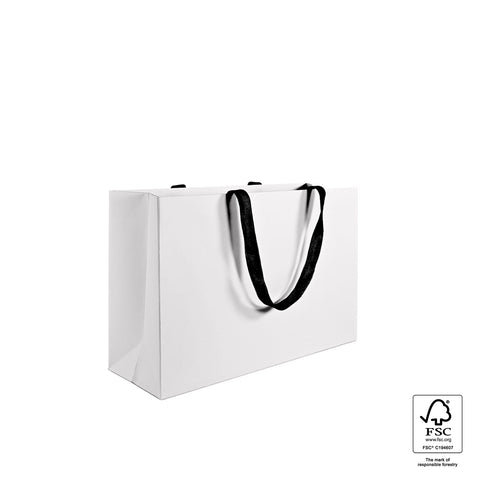 Image of White paper bag with black handles on a white background, featuring FSC certification logo.