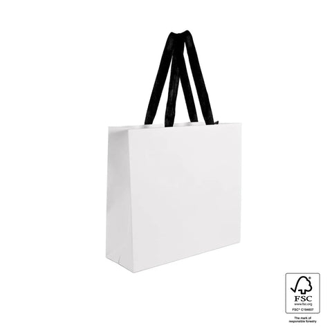 Image of White paper bag with black handles on a white background, featuring FSC certification logo.