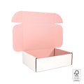 empty pastel pink mailing box