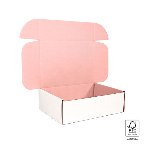 empty pastel pink mailing box