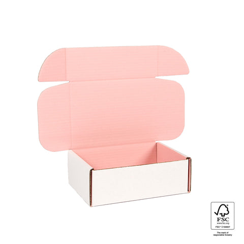 empty pastel pink small mailing box