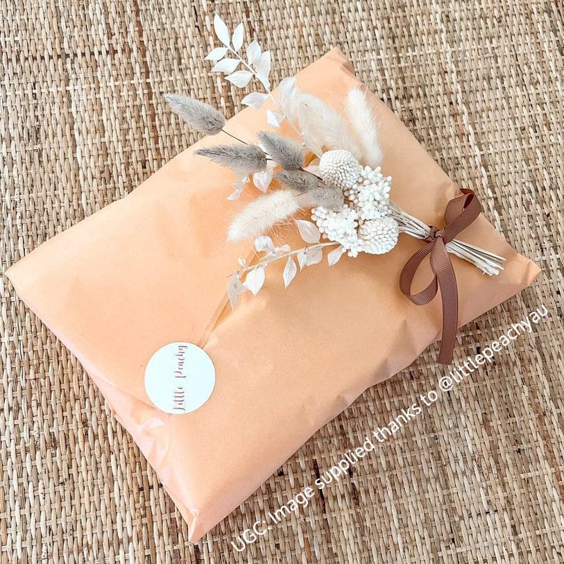 NE000183 NEON Acid-Free Tissue Paper - Peach can be used for wedding gift wrapping with satin ribbon.