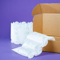 NE000333-NEON-Biodegradable void filler cushion inside the cardboard box.
